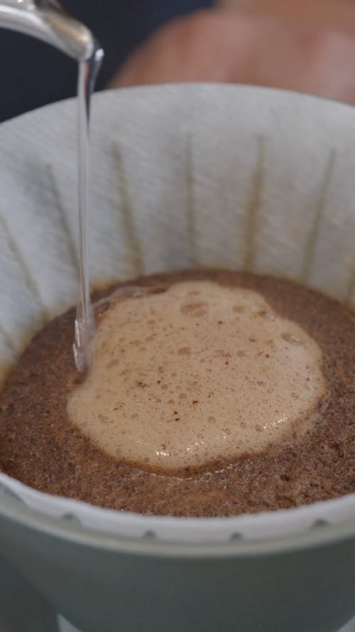 A Person Making Pour Over Coffee