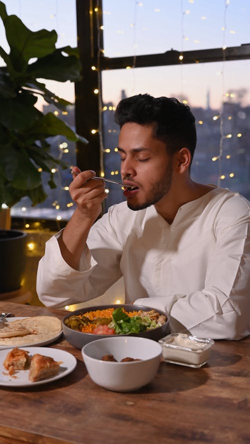 Man Eating Dinner