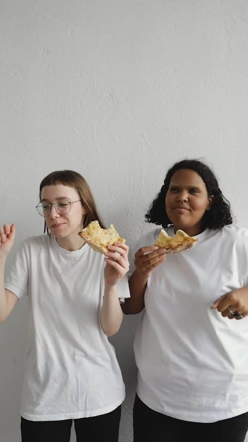 Women Dancing while Eating