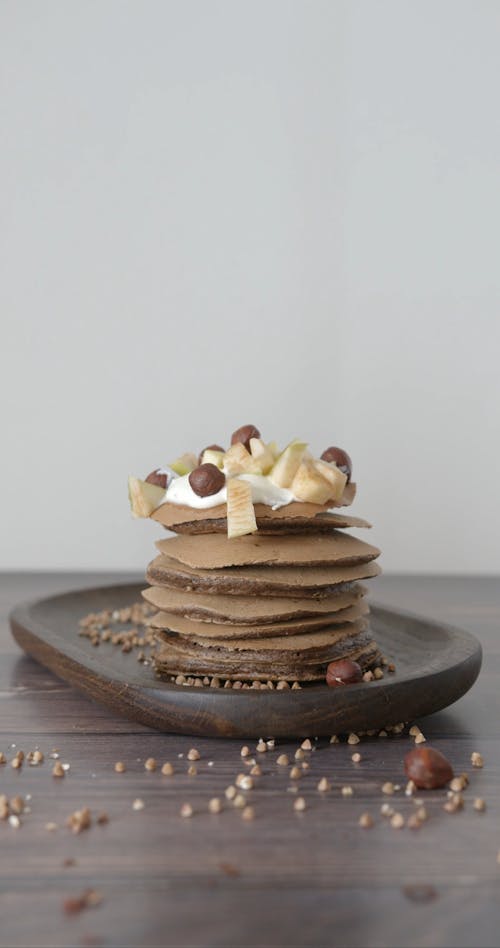 Chocolate Pancakes on a Wooden Plate