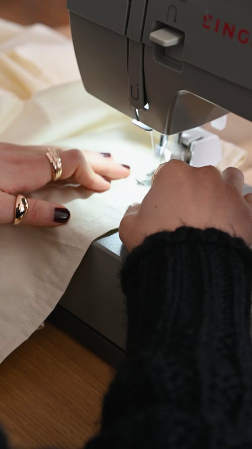 A Person Using a Sewing Machine