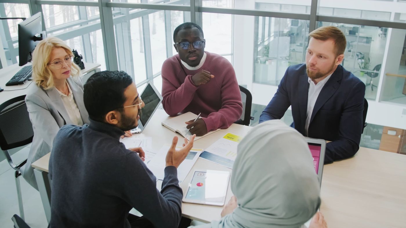 A sales team working together in an office