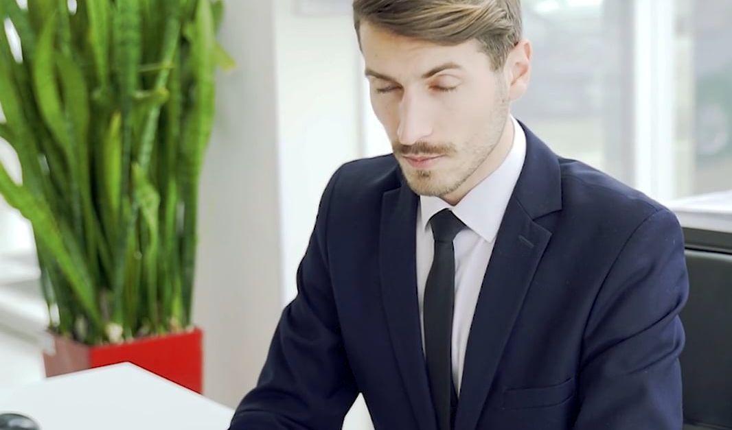 Man Using Computer 4k A Man in a Suit Using Computer while Sitting Free Stock Video Footage ...