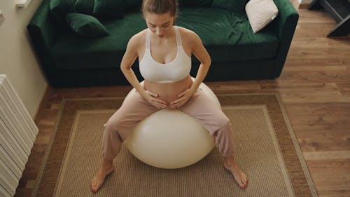 A Pregnant Woman Using Exercise Ball