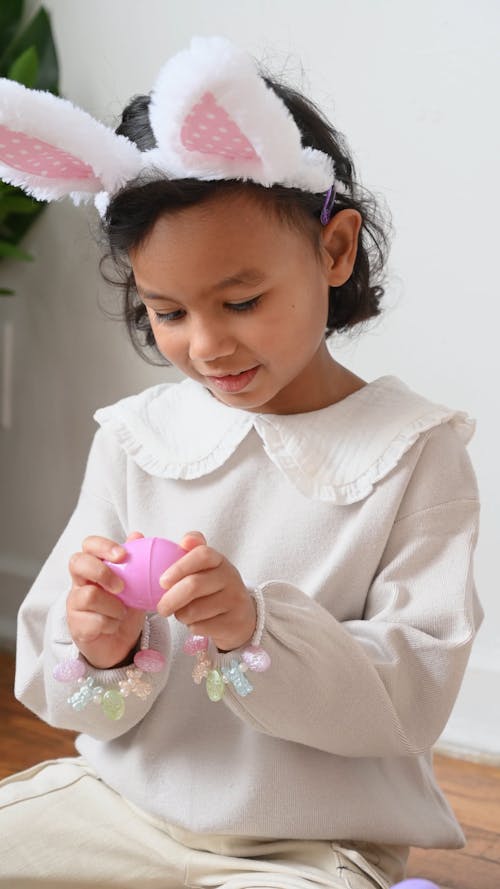 Little Girl Wearing Bunny Ears