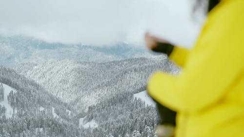Woman Wearing Her Winter Ski Mittens