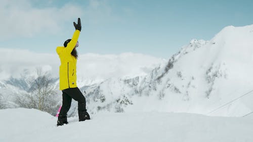 Woman Doing Cartwheel on the Snow