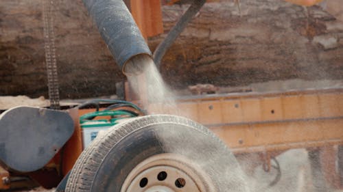 Wood Dust Coming Out from a Hose