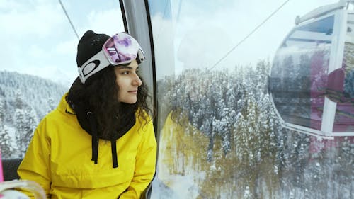 Woman Inside a Cable Car