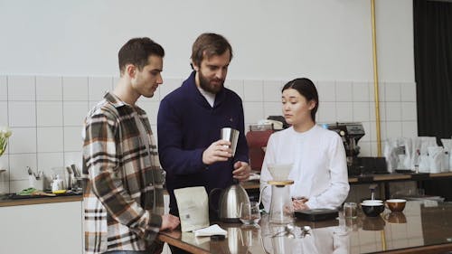 A Man Teaching How to Brew Coffee