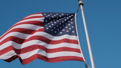 American Flag Waving on the Flagpole