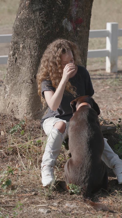 Person Training Dog Outside