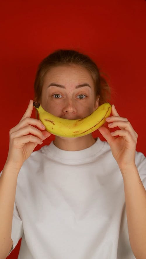 Woman Playing with a Banana