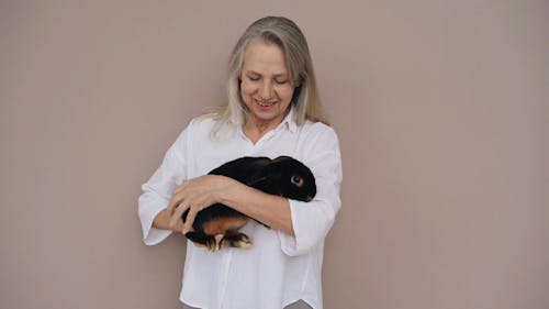 Woman Holding Rabbit