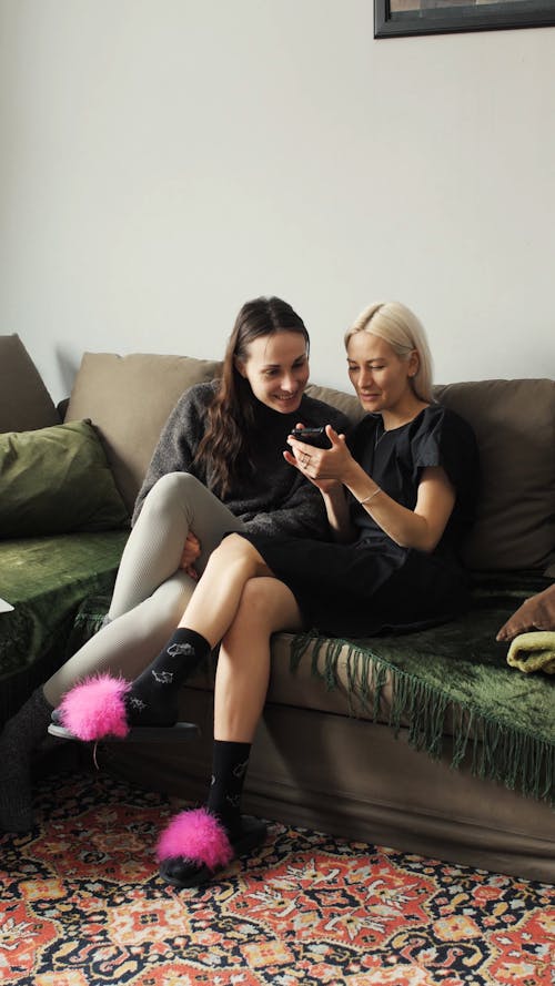 Women Sitting on Couch