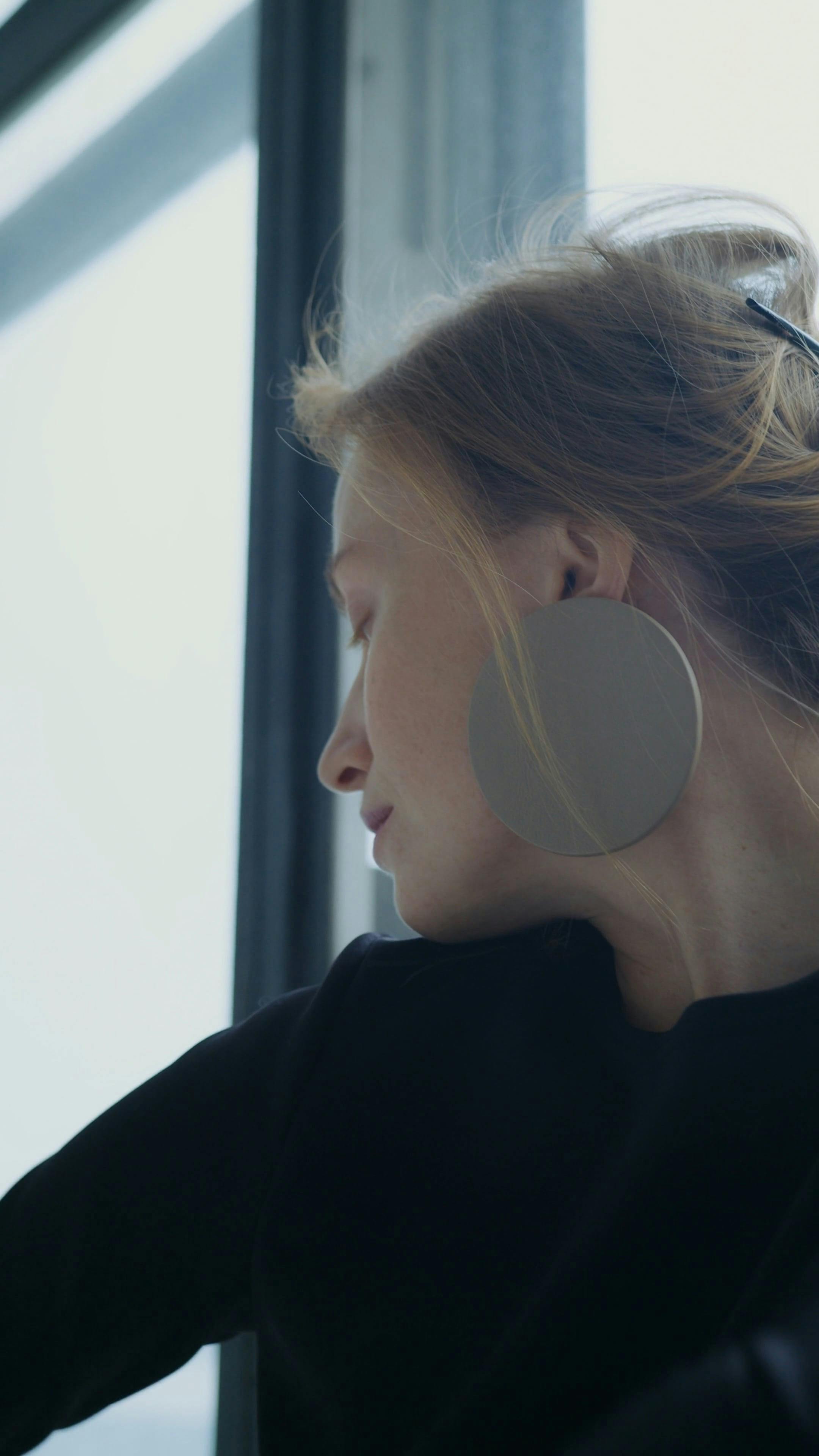 Woman Wearing Earrings Posing · Free Stock Video