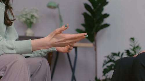 Close Up Video of Person Holding the Hands of Another Person