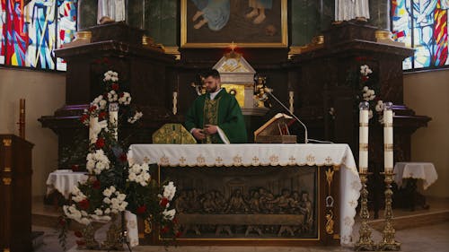 Priest Praying a Service
