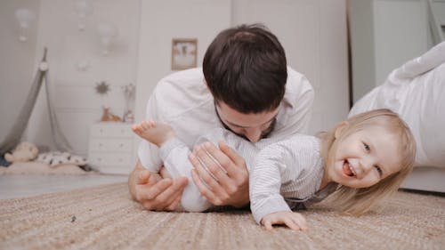 Father Playing with Daughter