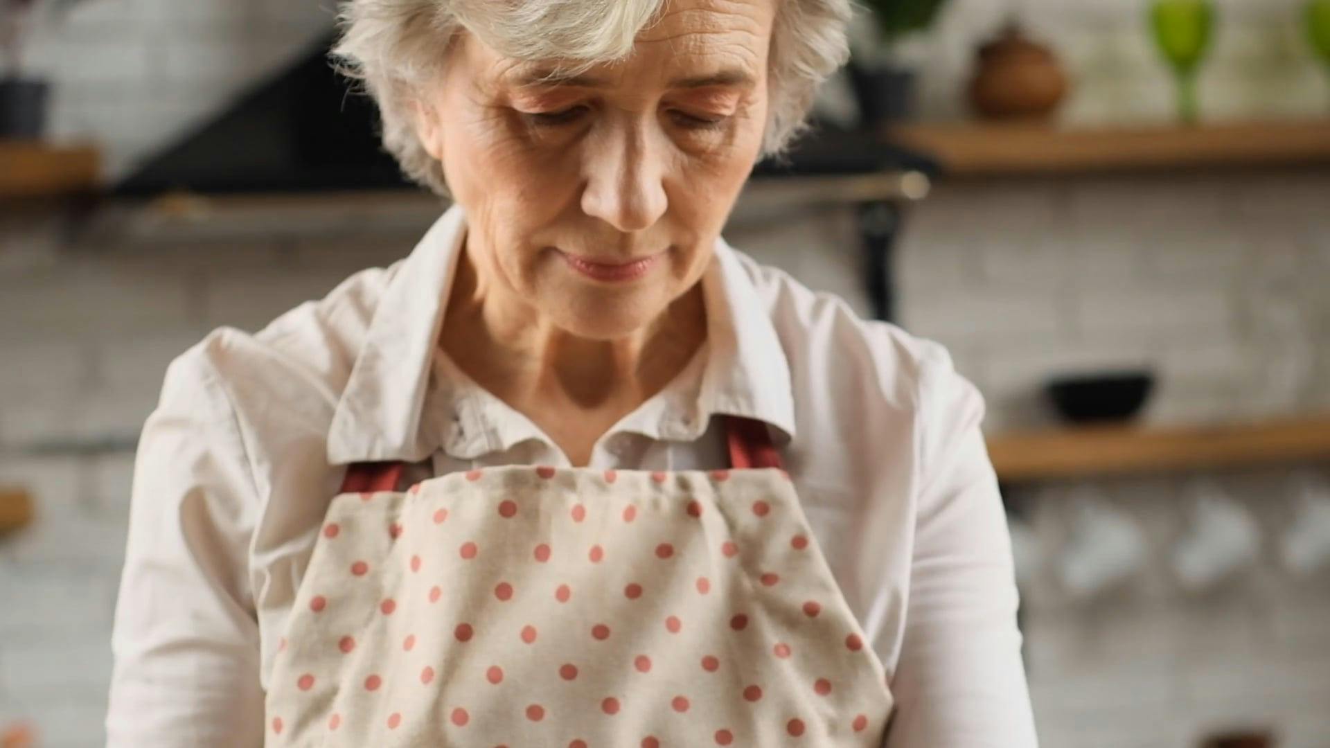 A Woman Dredging Meat in a Flour Free Stock Video Footage, RoyaltyFree