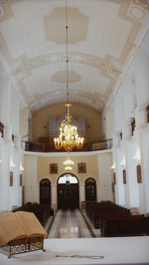 A Priest Praying on the Altar