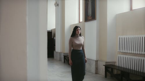 Woman Praying in a Church 