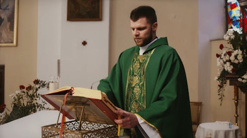 Priest Reading the Bible