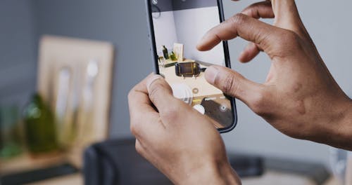 Person Taking Photo of an Utensil Item using a Smartphone