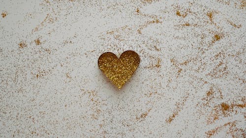 Gold Glitters in a Heart Shaped Cookie Cutter