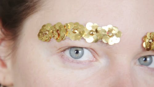 Sequins on a Person's Eyebrows