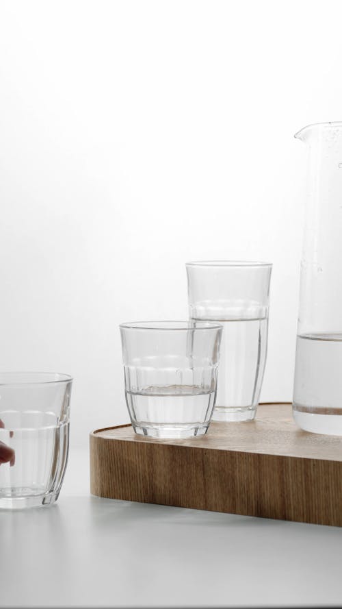 Glasses and Pitcher on a Wooden Tray