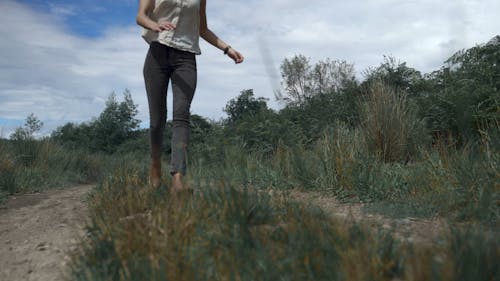 Woman Running on a Path