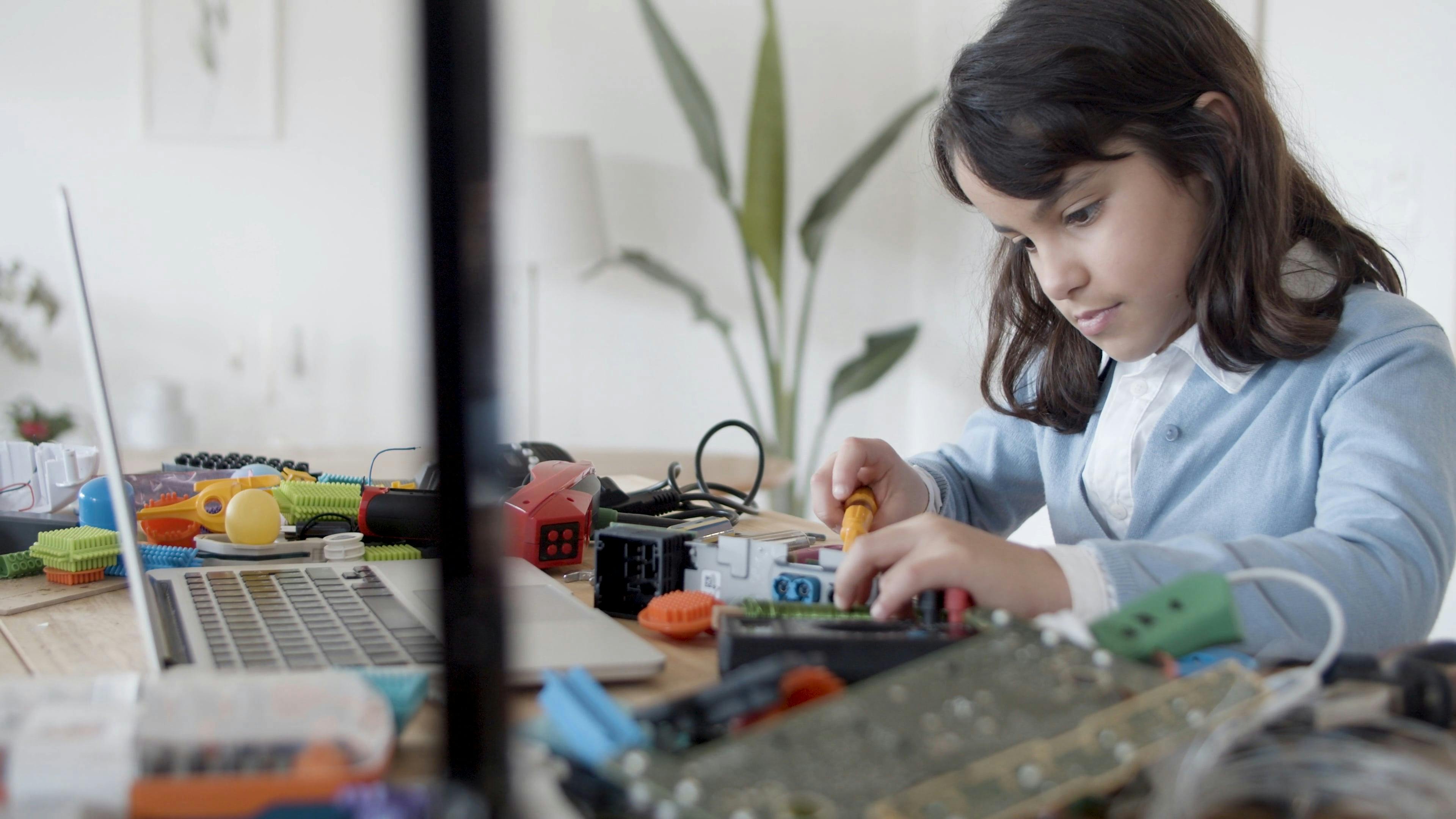 A Kid Fixing Electronic Board \u00b7 Free Stock Video