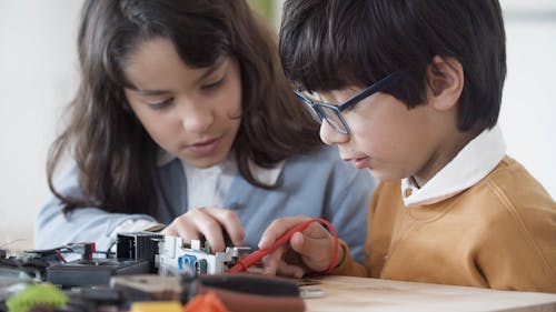 Children Doing Electrical Experiment