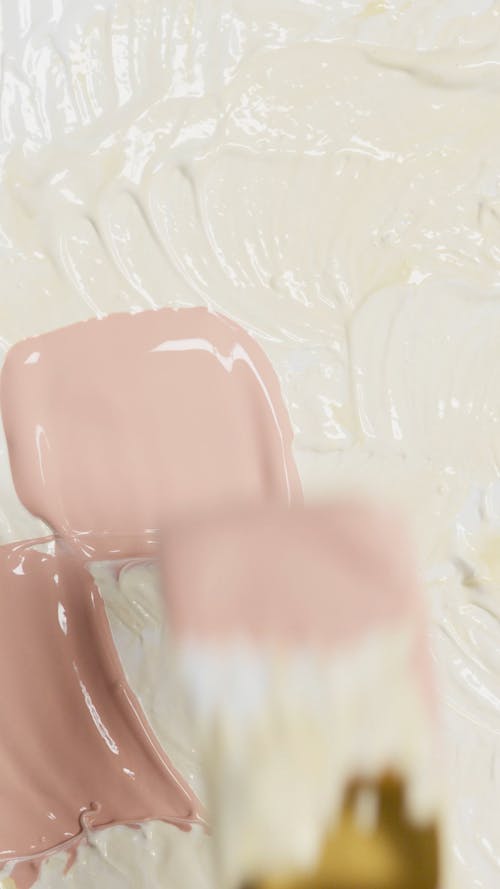 Close-Up Video of a Pink and White Paint