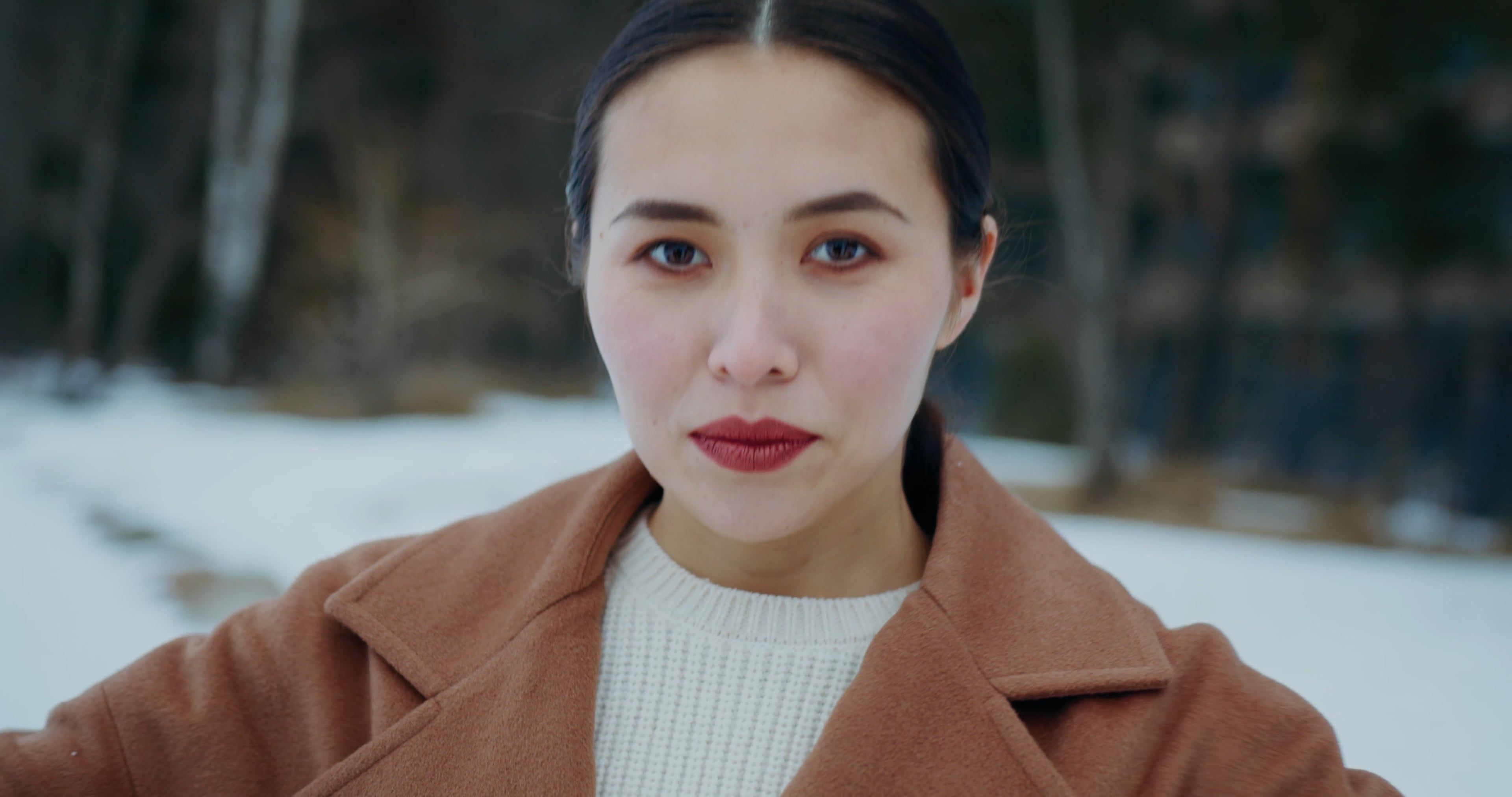 Woman Wearing a Brown Trench Coat · Free Stock Video