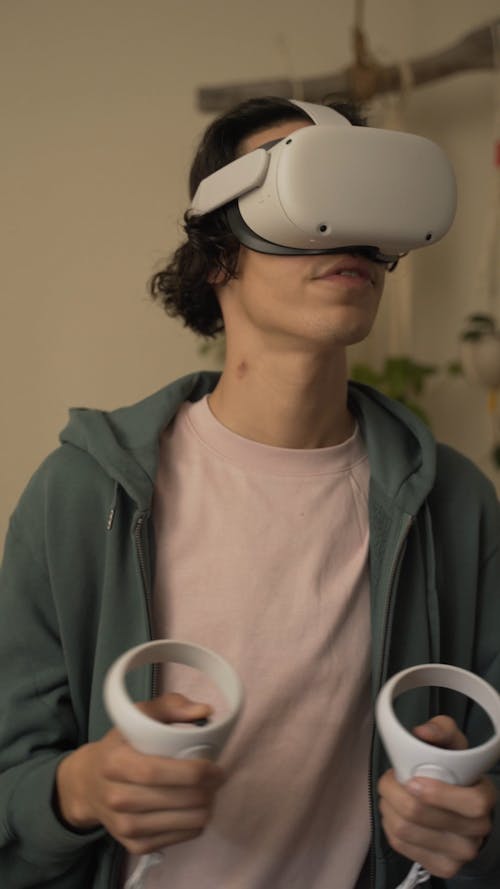 A Man Playing a Virtual Reality Game