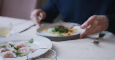 man eating at a restaurant