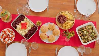 plates and food on wooden table