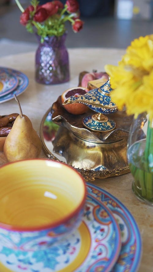 Oil Lamp and Fruits on a Metal Tray