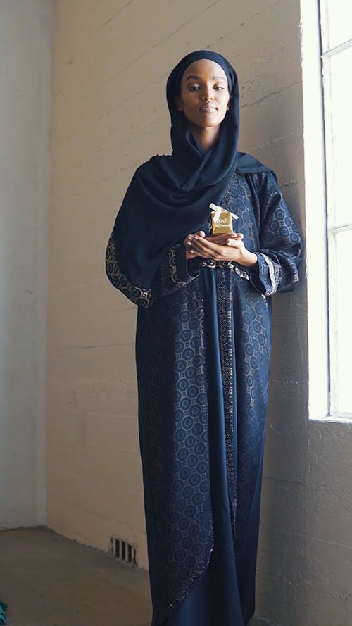 A Woman Holding a Gift