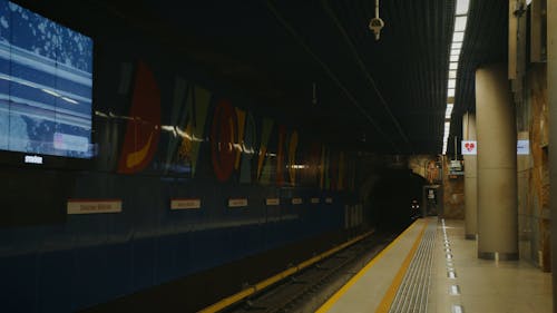 A Subway Train Arriving at a Station