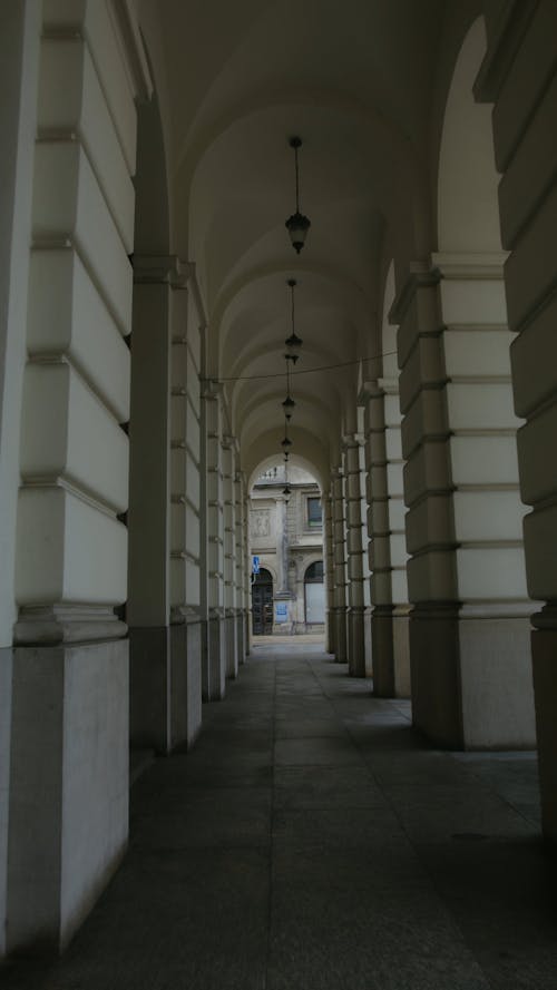 An Empty Narrow Hallway of a Building