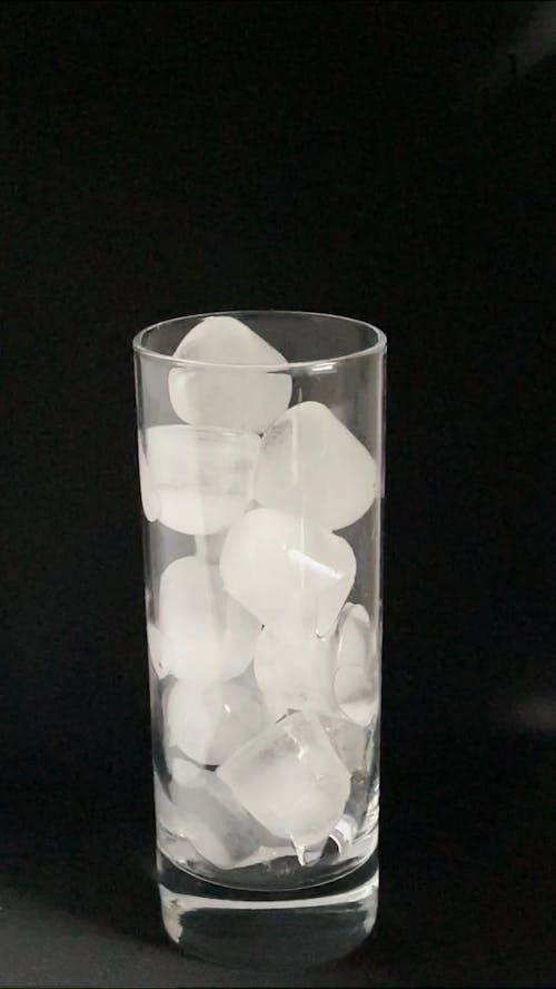 Pouring Sparkling Water In A Crystal Glass