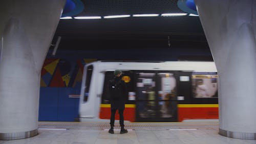 Man Waiting for a Subway Train