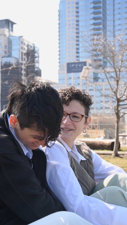 Cheerful Couple Embraced In The Park