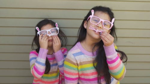 Young Girls Posing With Bunny Costume