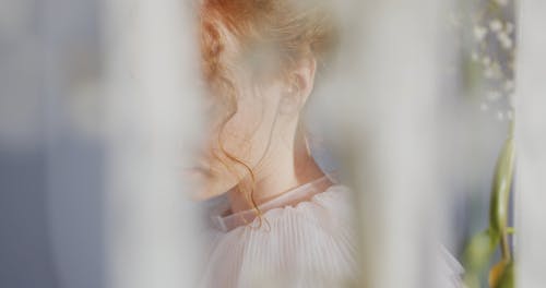 Woman Posing while Looking at Camera