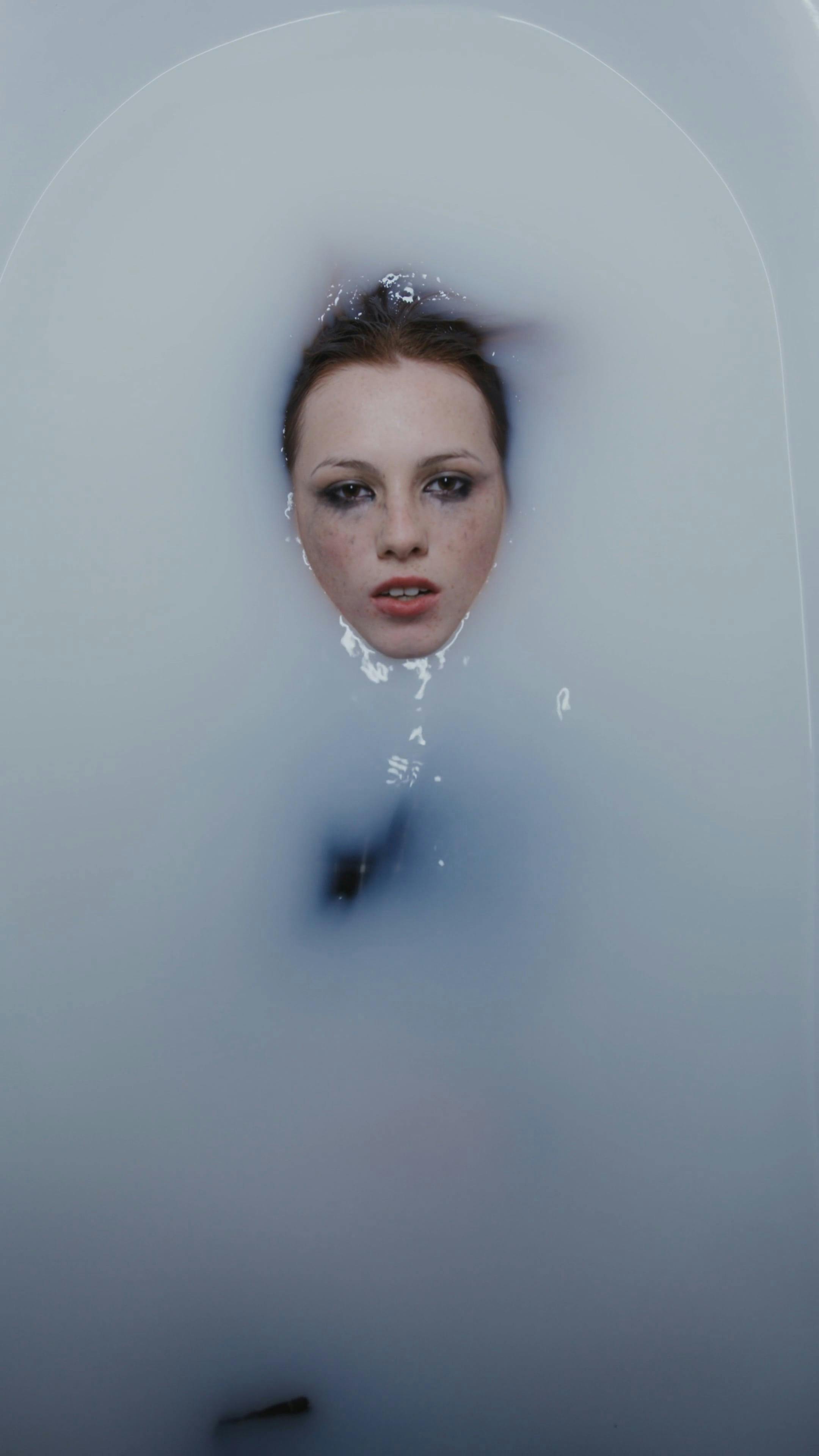 A Woman Drowning Herself on a Bathtub Free Stock Video Footage, Royalty