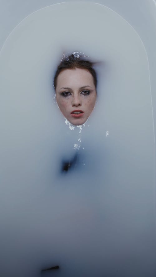 A Woman Drowning Herself on a Bathtub